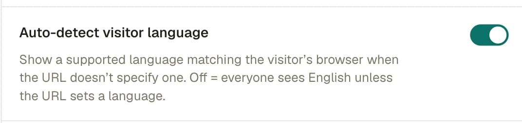 The editor Settings view with the "Auto-detect visitor language" switch turned on, above the Default language selector set to English